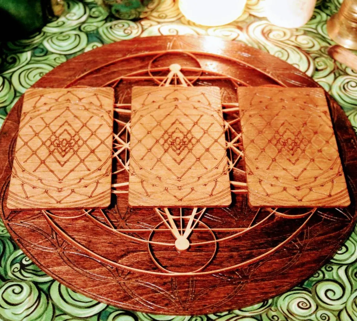 Wooden laser cut Tarot board. Three card spread scared geometry design
